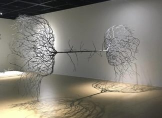 Artist Creates Intricate Metal Root Sculptures That Depict Human Figures