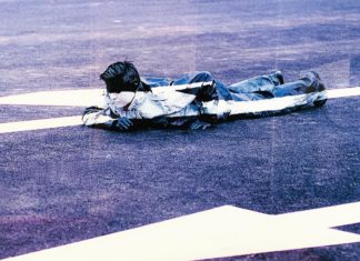 Chinese Photographer Blends into the Background As a Form of Protest