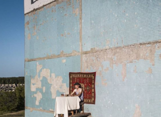 Russian Artist Creates Risky Performance on a Building