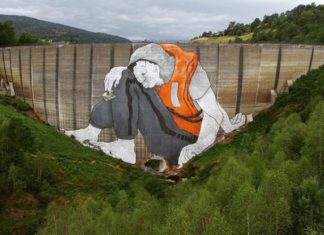 Big Giants Rest on the Rooftops in Ella & Pitr’s Murals