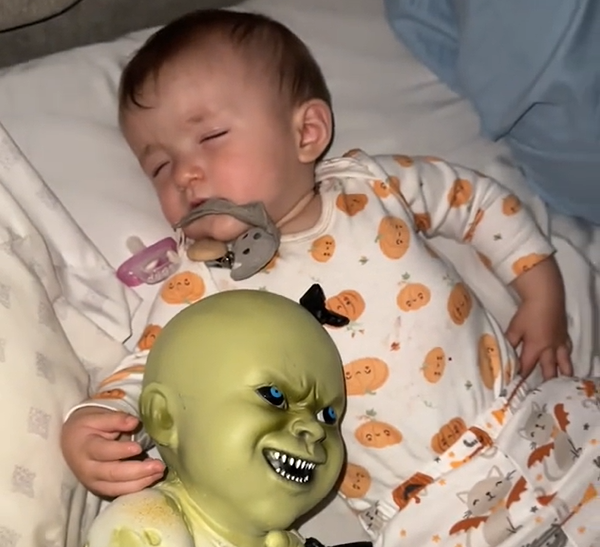 Baby Amazes The Internet With Her Reaction To Receiving A Scary Doll As